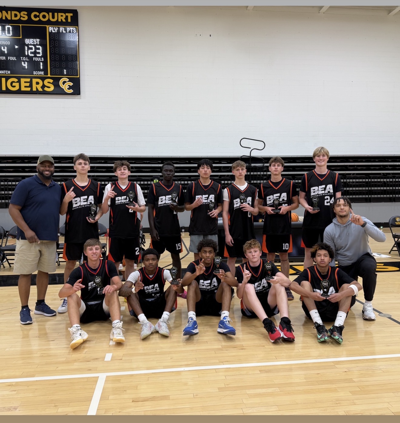 BEA Hoops high school team and coaches celebrating an undefeated championship run in Colorado